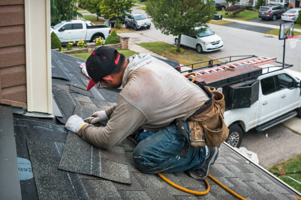 Professional Flat Roof Repair technician working in Doylestown, WI